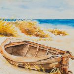 Kaputtes Holzboot am Strand der Nordsee